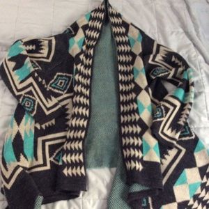 Asymmetrical cardigan.
